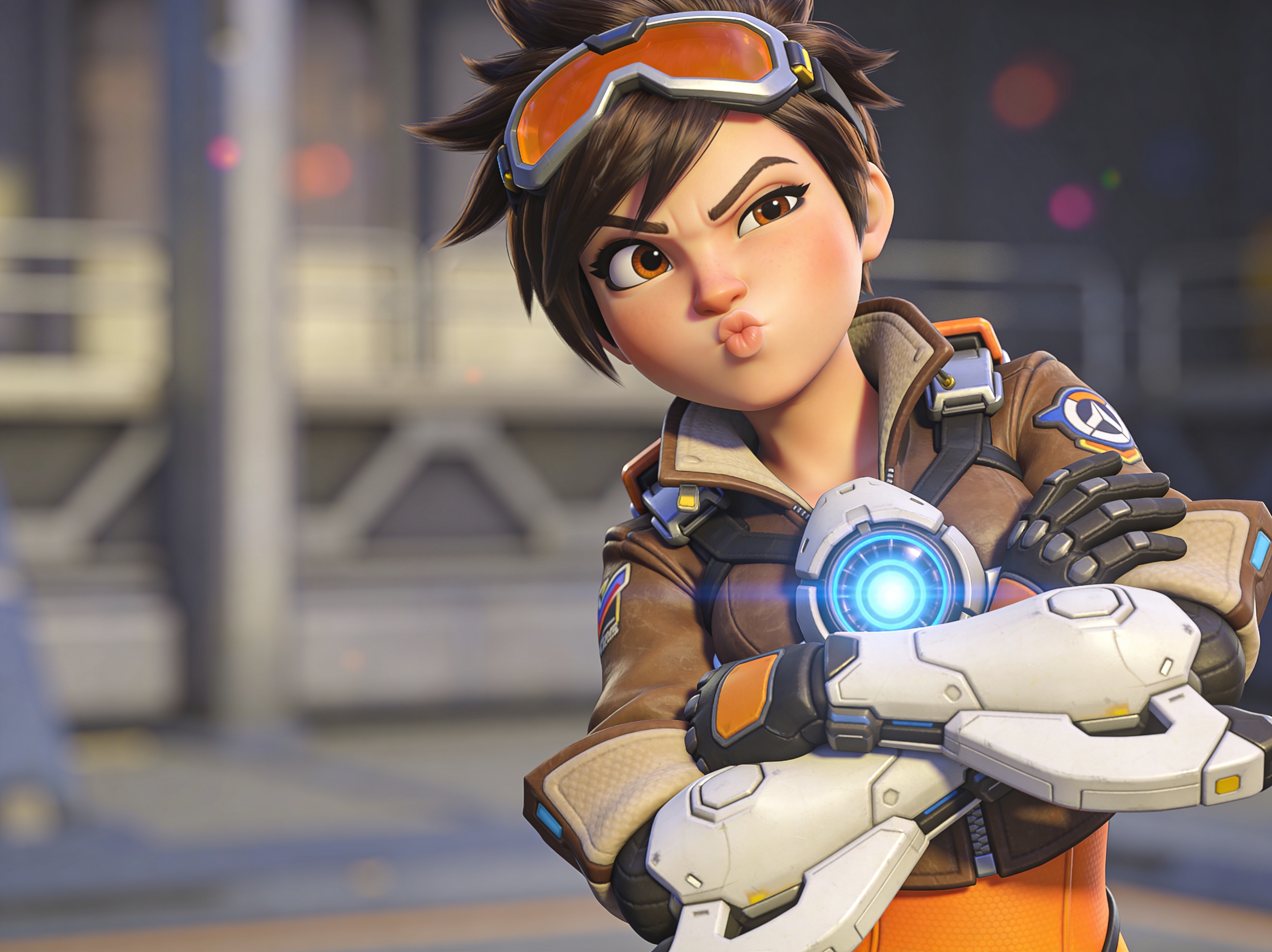 Cartoon Overwatch heroine D.Va in a brown jacket with orange goggles, crossing arms with a glowing core.